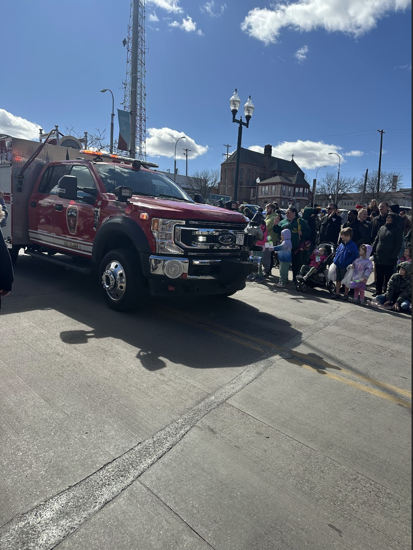 The Sioux Falls Fire and Police Departments culminate the parade with several fire trucks and police cars. 